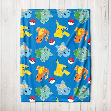Флісова ковдра Pokmon 130x170 см Офіційно ліцензована, мяка та пухнаста Сертифікована Oeko-Tex, легка у догляді та довговічна Ідея подарунка для дітей та дорослих Pikachu & Friends