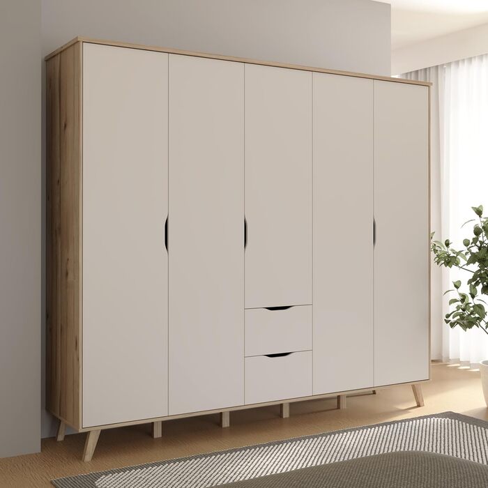 Гардероб Forte VANKKA 230, шафа в скандинавському стилі з 5 дверима на петлях та 2 шухлядами, витончені меблеві ніжки, інженерна деревина, декор дубовими дошками Білий, 228,8 см завширшки x 201,5 см заввишки x 52,7 см завглибшки. Біло-дубова 5-дверна шафа