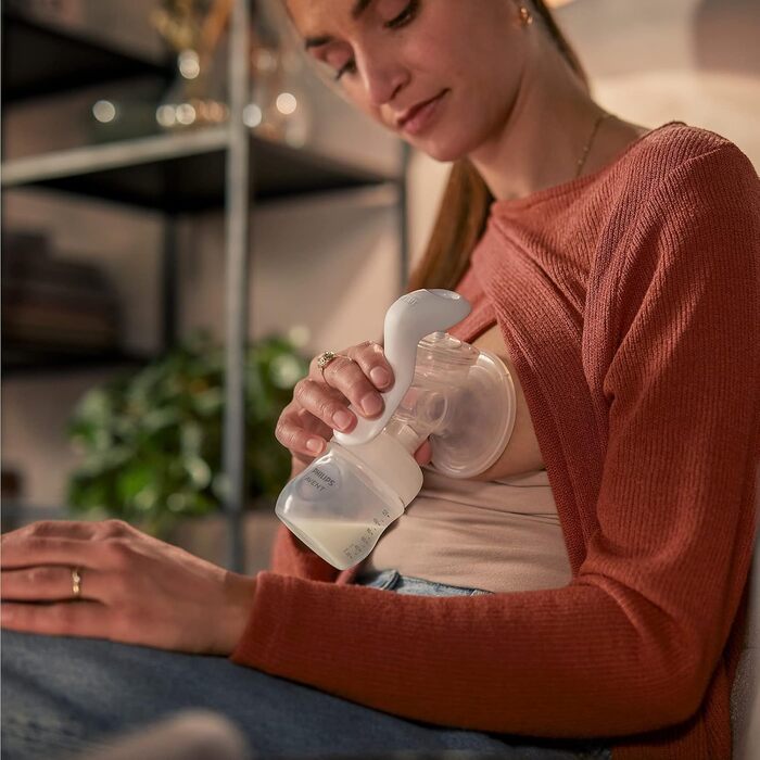Ручний молоковідсмоктувач Philips Avent - легке зціджування, технологія Natural Motion, без бісфенолу А (модель SCF430/01) Прозори