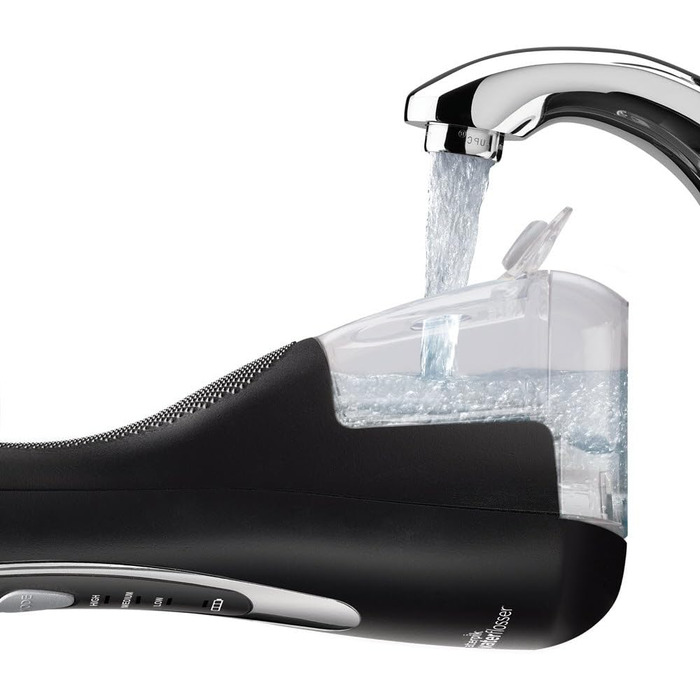 Акумуляторний іригатор для порожнини рота Waterpik Cordless Advanced Waterflosser з 4 насадками, діапазон тиску від 3.1 до 5.2 регулюється за допомогою 3 налаштувань тиску, з індукційною системою зарядки, чорний (WP-562EU), 1 упаковка