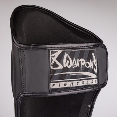 ЗБРОЇ Щитки для гомілок Unlimited 2.0, матово-чорні, для тренувань та змагань, високоякісна синтетична шкіра та ідеальна амортизація, муай-тай, K1, MMA, карате та кікбоксинг, 8