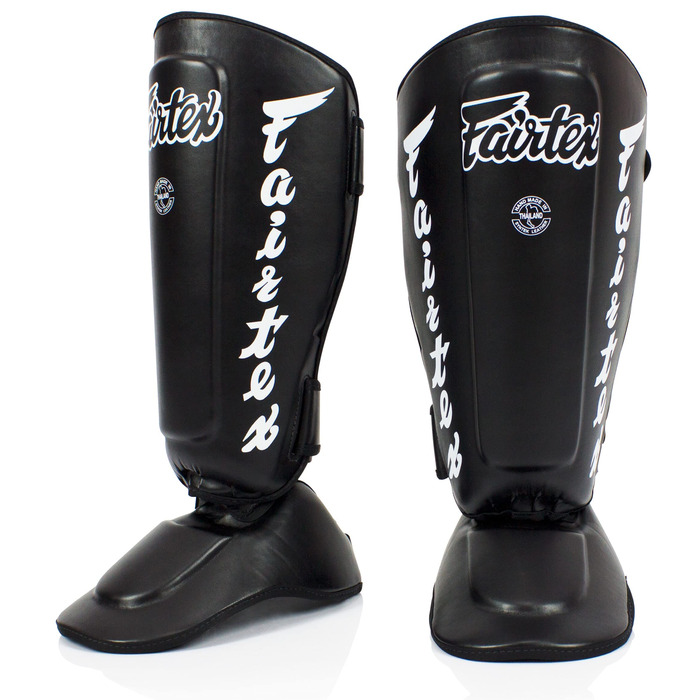 Щитки для гомілок Fairtex SP7 для муай-тай для чоловіків, жінок та дітей Виготовлені зі шкіри Syntek, високоякісні, легкі та міцні Знімний захист гомілки та стопи, чорні, розмір L