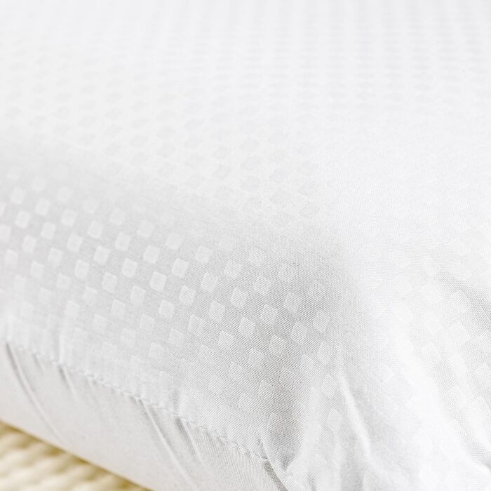 Ергономічна в&39язкопружна подушка з подвійним регульованим чохлом та серцевиною з піни з ефектом пам&39яті для сну на боці або спині.