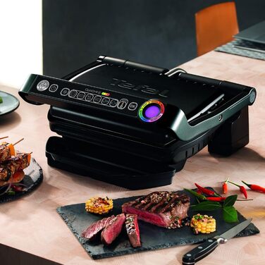 Контактний гриль TEFAL GC7128 OPTIGRILL 6 автоматичних програм Ручний режим з 4 режимами температури Ідеальні результати приготування на грилі завдяки вимірюванню товщини Чорний