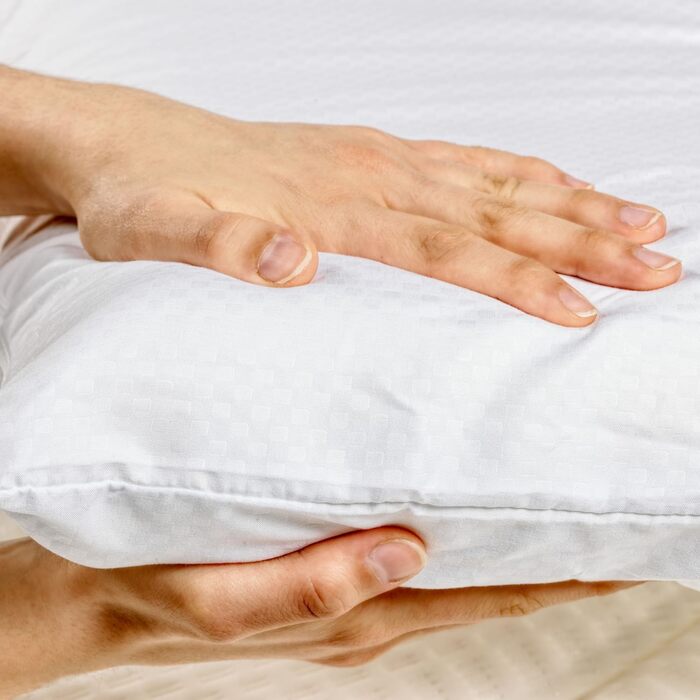 Ергономічна в&39язкопружна подушка з подвійним регульованим чохлом та серцевиною з піни з ефектом пам&39яті для сну на боці або спині.