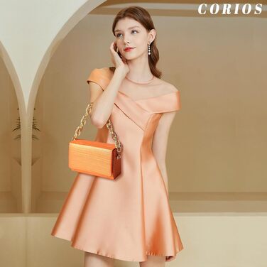 Оранжеве вечірнє клатч-каше з паєтками для весілля та особливих подій. Елегантна сумочка на ланцюжку через плече.