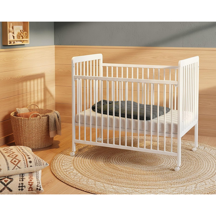 Дерев&39яне дитяче ліжечко з колесами 60x120 Essentiel White Дитяче ліжко З регульованою рейковою основою (3 положення) 4 колеса з гальмами Дитяче ліжко White, 4 WEBABY -