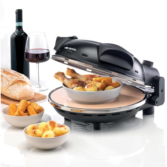 Піч для піци Ariete 928 4 хвилини, ілюмінатор для контролю приготування, 1200 Вт, максимальна температура 400 C, 2 лопатки з нержавіючої сталі, вогнетривкий камінь з антипригарним покриттям, чорний