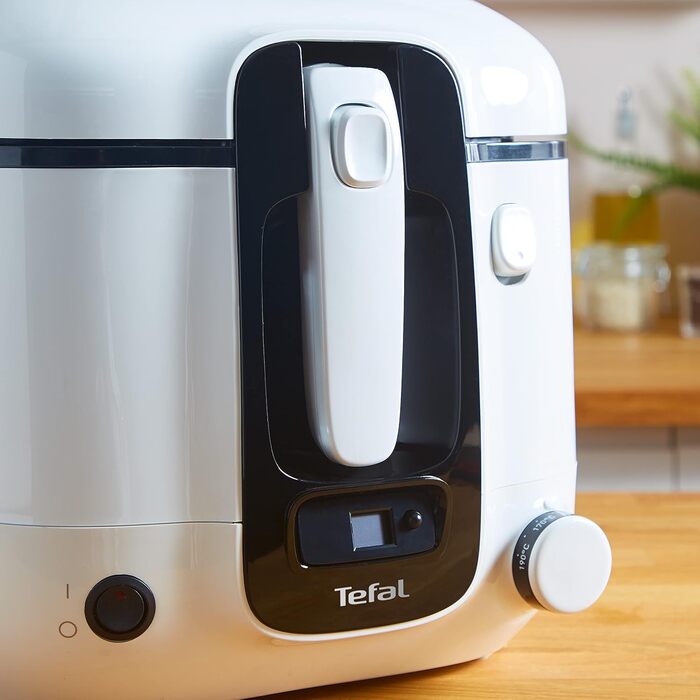 Фритюрниця Tefal Super Uno FR3140 в т.ч. таймер Ємність 2,2 літра Запчастини, які можна мити в посудомийній машині Антипригарне покриття Фільтр для видалення запахів Захист від бризок Знімний контейнер Білий/Чорний Super Uno з таймером білий/чорний