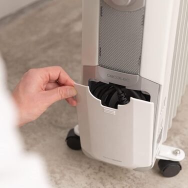 Масляний радіатор Cecotec ReadyWarm 11000 Space. Масляний радіатор потужністю 2500 Вт з 11 нагрівальними ребрами та 3 рівнями потужності, площа охоплення 25 м, місце для зберігання кабелю, легке керування, ручка, колеса. Білий. 2500 Вт