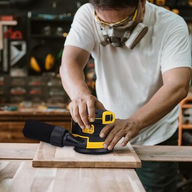 Вольтова акумуляторна ексцентрикова шліфувальна машина DCW210N (шліфувальний папір ø 125 мм, електронне регулювання швидкості, пил