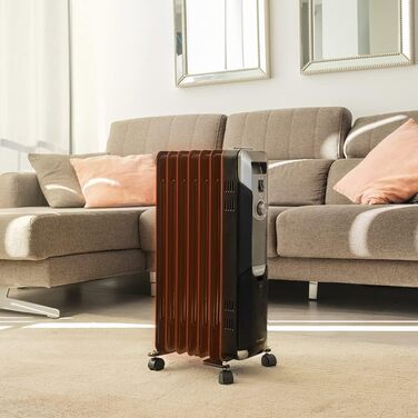 Масляний обігрівач Cecotec ReadyWarm 7000 Space Black 1500 Вт, 7 секцій, 3 режими потужності, відсік для кабелю, зручне керування, ручка, колеса та подвійна система безпеки, чорний, для приміщень до 15 м