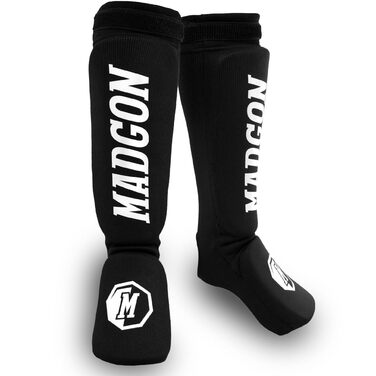 Щитки для ніг MADGON з ідеальною посадкою та ідеальною підкладкою Захист гомілок з низьким потовиділенням. Тканинні щитки для ніг для бойових мистецтв, MMA, кікбоксингу - 1 пара з сумкою Чорний/Білий розмір S