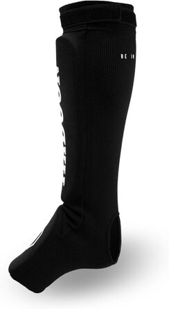 Щитки для ніг MADGON з ідеальною посадкою та ідеальною підкладкою Захист гомілок з низьким потовиділенням. Тканинні щитки для ніг для бойових мистецтв, MMA, кікбоксингу - 1 пара з сумкою Чорний/Білий розмір S