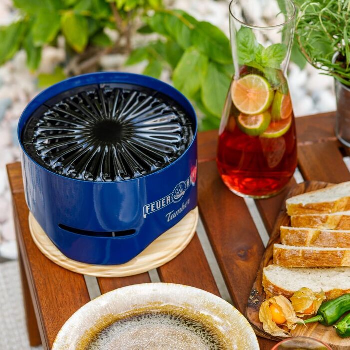 Настільний гриль Feuerhand Tamber синього кольору Емальована решітка для гриля З антипригарним покриттям Горіння з низьким рівнем диму Зливні канавки для мастила та рідин, що подаються зі столом гриль на вугіллі