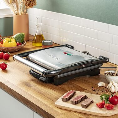 Контактний гриль Tefal Inicio GC241D Електричний гриль/бутербродниця Гриль з низьким вмістом жиру Паніні, Тости, Стейк, Овочі Пластини для гриля з антипригарним покриттям 2000 Вт 36,3x10,8x33,2 см Нержавіюча сталь/чорний єдиний стандарт