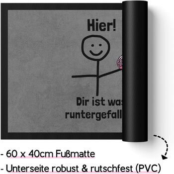 Щось упало на килимок перед дверима. Смішне прислів&39я фігурка з мозку-палички.