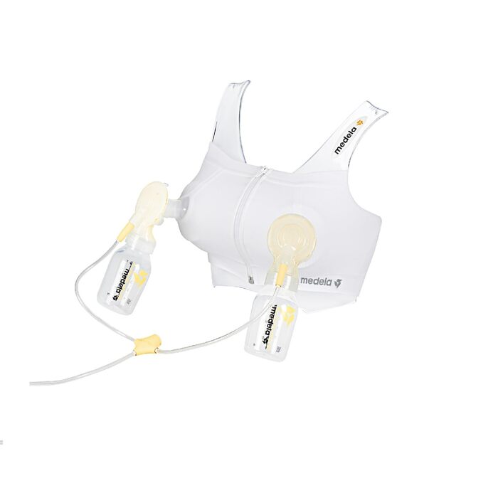 Для зручного зціджування без рук Сумісний з усіма молоковідсмоктувачами Medela