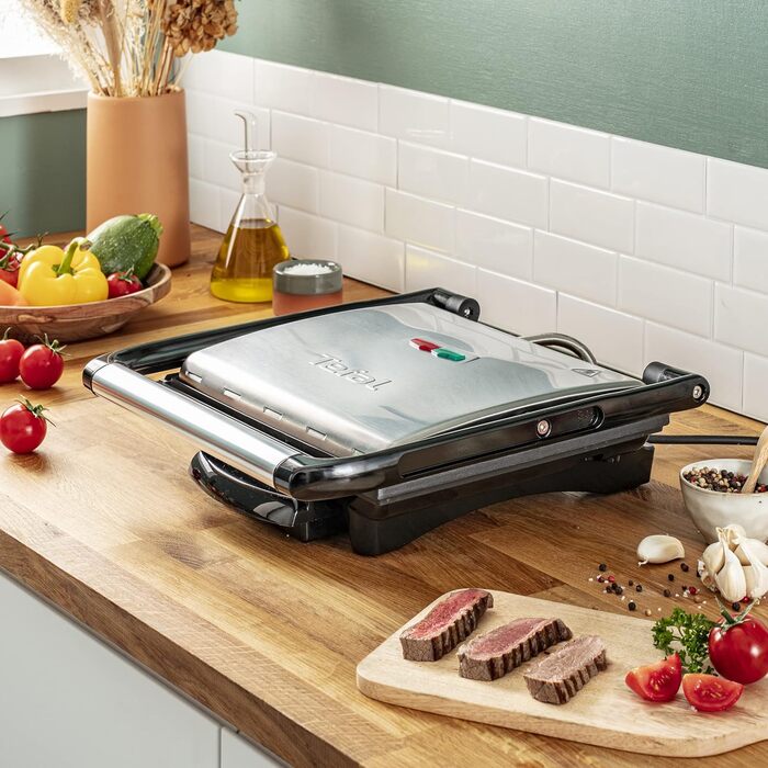 Контактний гриль Tefal Inicio GC241D Електричний гриль/бутербродниця Гриль з низьким вмістом жиру Паніні, Тости, Стейк, Овочі Пластини для гриля з антипригарним покриттям 2000 Вт 36,3x10,8x33,2 см Нержавіюча сталь/чорний єдиний стандарт