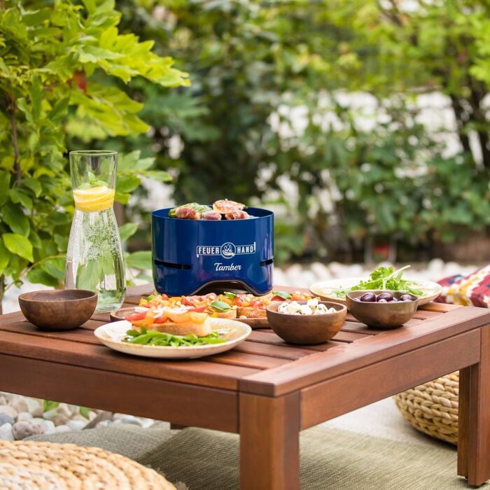 Настільний гриль Feuerhand Tamber синього кольору Емальована решітка для гриля З антипригарним покриттям Горіння з низьким рівнем диму Зливні канавки для мастила та рідин, що подаються зі столом гриль на вугіллі