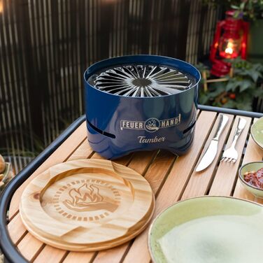 Настільний гриль Feuerhand Tamber синього кольору Емальована решітка для гриля З антипригарним покриттям Горіння з низьким рівнем диму Зливні канавки для мастила та рідин, що подаються зі столом гриль на вугіллі