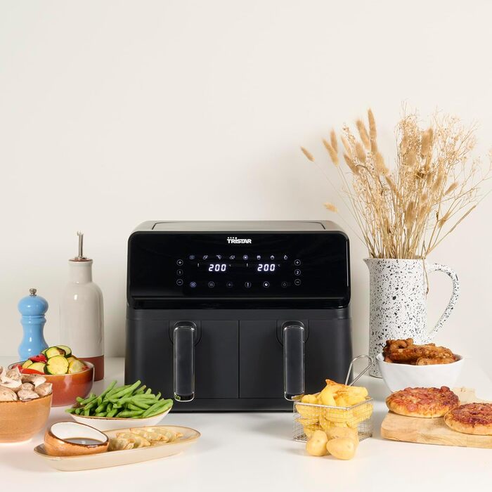 Цифрова фритюрниця Tristar з подвійним кошиком - 2 x 4 л ємність - 2700 Вт - 8 програм - температура регулюється в кожному кошику, чорний