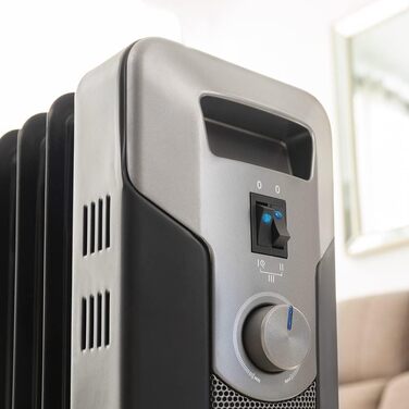 Масляний обігрівач Cecotec ReadyWarm 7000 Space Black 1500 Вт, 7 секцій, 3 режими потужності, відсік для кабелю, зручне керування, ручка, колеса та подвійна система безпеки, чорний, для приміщень до 15 м
