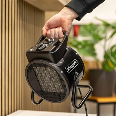 Електричний обігрівач Scheppach EH3000 3000 Вт 2000 Вт Плавне регулювання Потік повітря 320 м/год 585 C Керамічний вентилятор-обігрівач До 60 кубічних метрів 3 рівні нагріву Захист від перегріву та ручка для перенесення