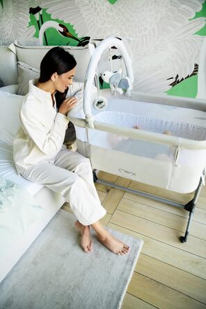 Багатофункціональне приліжкове та дитяче ліжко Momi REVO, 6-рівневе регулювання висоти від 72 до 82 см, з колесами, включаючи матрац, кріпильні ремені, сітку від комах та ручку з іграшками