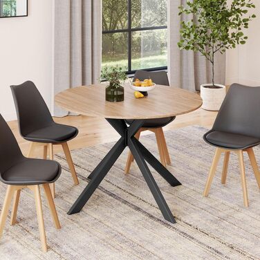 Розкладний круглий обідній стіл ALIX 4-8 персон на ніжках-павуках, дерево та чорний колір, 110-150 см