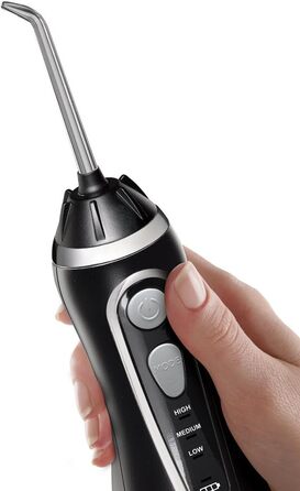 Акумуляторний іригатор для порожнини рота Waterpik Cordless Advanced Waterflosser з 4 насадками, діапазон тиску від 3.1 до 5.2 регулюється за допомогою 3 налаштувань тиску, з індукційною системою зарядки, чорний (WP-562EU), 1 упаковка