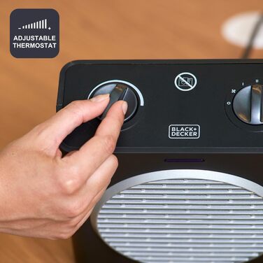 Компактний обігрівач потужністю 2000 Вт Регульовані рівні потужності 3 режими роботи Регульований електронний термостат Система захисту від перекидання Матово-чорний та сірий 2000 Вт Компактний, 2003E