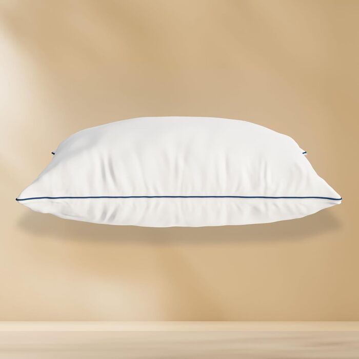 Класична пухнаста подушка Emma 80x80 Овальна подушка з мікрофібри, регульована, можна прати в пральній машині, ергономічна, мяка та для індивідуально регульованого комфорту сну. Класична 80x80 см
