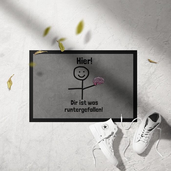 Щось упало на килимок перед дверима. Смішне прислів&39я фігурка з мозку-палички.