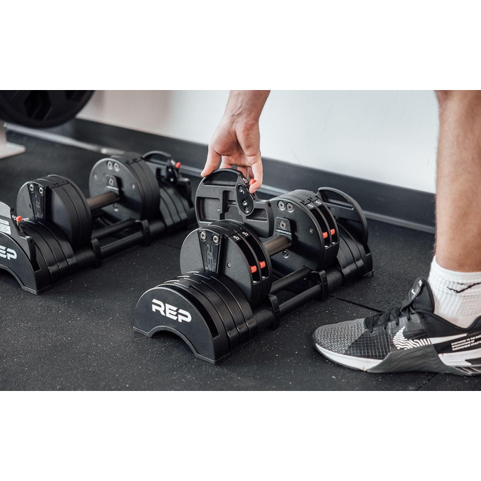 Регульовані гантелі Rep Fitness Quickdraw, доступні в кількох діапазонах ваги, включаючи 5-30, 5-40, 5-50 та 2,3-27,2 кг, 2,3 - 18 кг