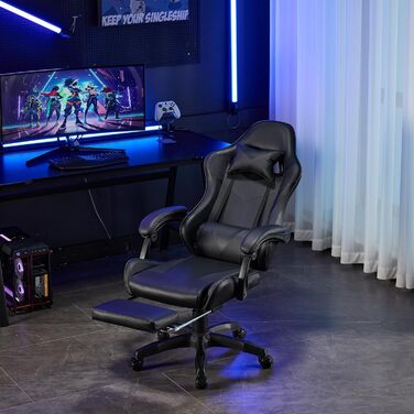 Шкіряне ігрове крісло, поворотне на 360 та ергономічне, з підголівником, поперековою опорою та підставкою для ніг, чорне