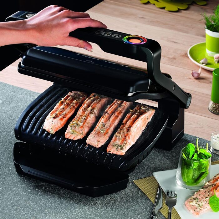 Контактний гриль TEFAL GC7128 OPTIGRILL 6 автоматичних програм Ручний режим з 4 режимами температури Ідеальні результати приготування на грилі завдяки вимірюванню товщини Чорний