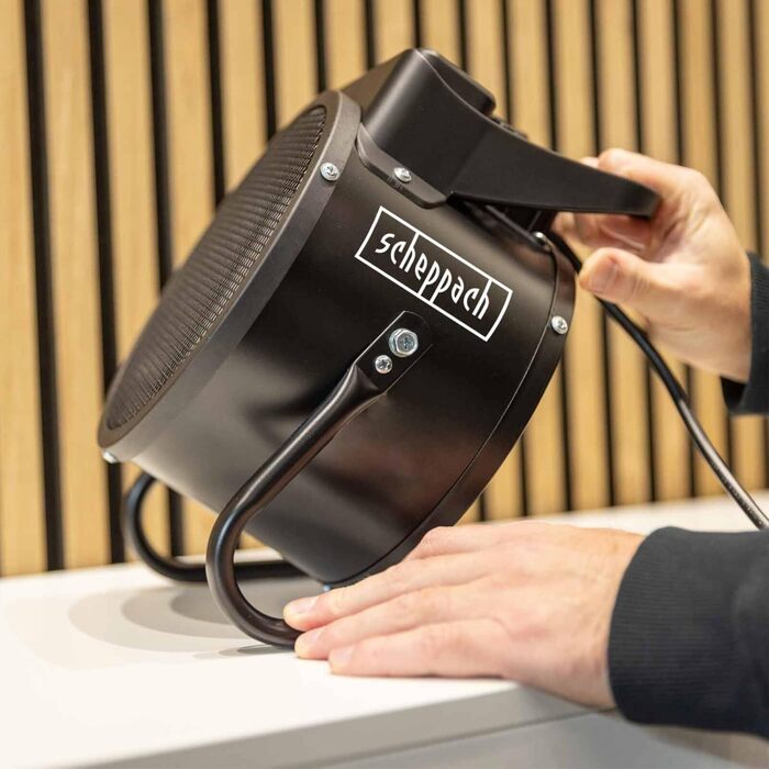 Електричний обігрівач Scheppach EH3000 3000 Вт 2000 Вт Плавне регулювання Потік повітря 320 м/год 585 C Керамічний вентилятор-обігрівач До 60 кубічних метрів 3 рівні нагріву Захист від перегріву та ручка для перенесення