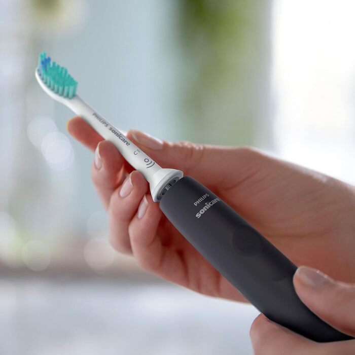 Електрична зубна щітка Philips Sonicare серії 3100 зі звуковою технологією, з датчиком тиску та індикатором заміни головки щітки, чорна (модель HX3671/14) одинарна