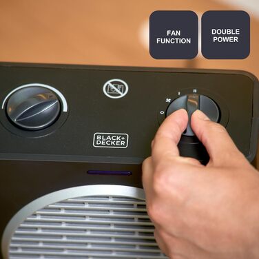 Компактний обігрівач потужністю 2000 Вт Регульовані рівні потужності 3 режими роботи Регульований електронний термостат Система захисту від перекидання Матово-чорний та сірий 2000 Вт Компактний, 2003E