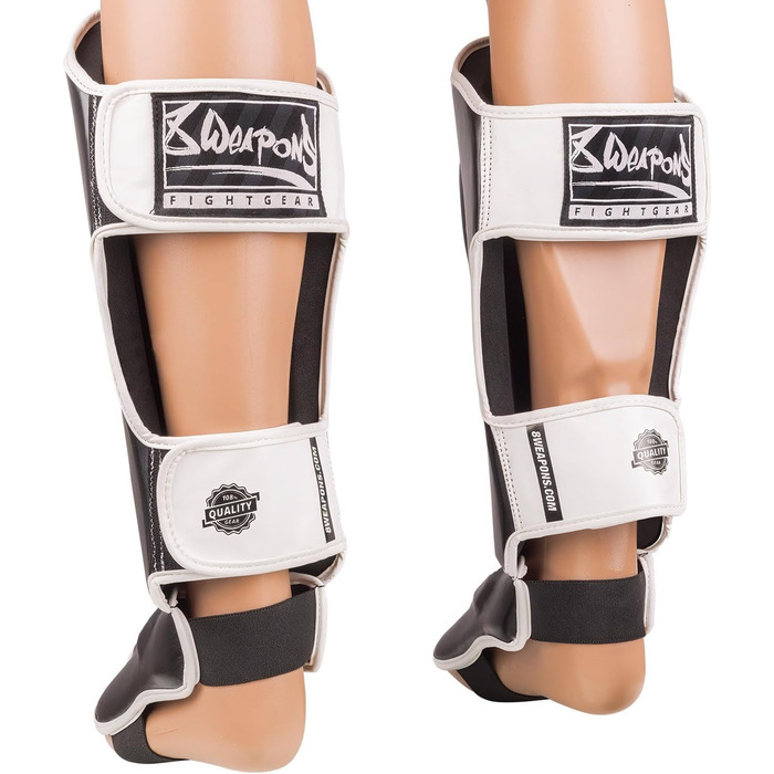 ВИРОБІВ ЗБРОЇ Щитки для гомілок Unlimited 2.0, чорно-білі, для тренувань та змагань, високоякісна синтетична шкіра та ідеальна амортизація, муай-тай, K1, MMA, карате та кікбоксинг, 8
