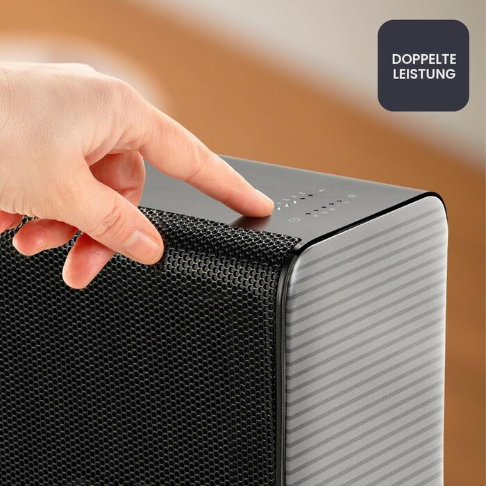Керамічний обігрівач BlackDecker BXSH1800E, PTC-технологія, 1800 Вт, електронний термостат, 2 режими інтенсивності, таймер на 7 годин, низький рівень шуму, захист від перекидання та перегріву, чорний