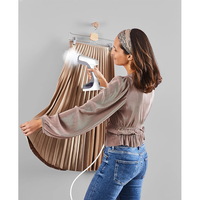 Секунд нагріву 1400 Вт до 25 г/хв. резервуар для води 150 мл 8 хв. відпарювання мережевий кабель 2,6 м різні аксесуари білий/синій