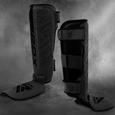 Щитки для гомілок RDX для тайського боксу, кікбоксингу, бойових мистецтв, тренувань змішаних бойових мистецтв (MMA), Maya Hide, шкіри, кара, захисту гомілок, муай-тай, крав-мага, спарингу, бразильського джиу-джитсу, карате та бойових мистецтв, захисту ніг
