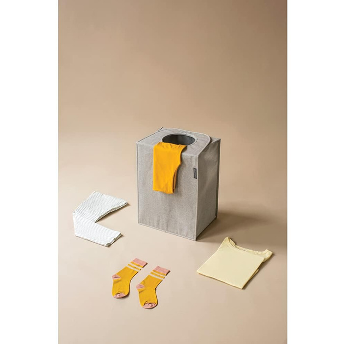 Мішок для білизни - Швидке відкриття - Міцний текстильний мішок - Економія місця - Кришка складається, утворюючи ручки - Легке спорожнення - Сірий - 55 л - 29,5 x 54,0 x 50,5 см