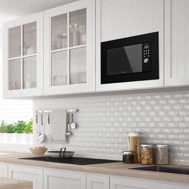 Цифрова і вбудована мікрохвильова піч GrandHeat 2000 вбудована в чорному кольорі. Ємність 20 літрів з грилем і потужністю 700 Вт Black 20 L Digital