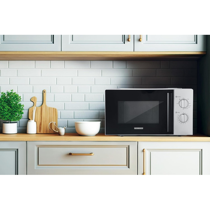 Мікрохвильова піч HEINRICHS, компактна мікрохвильова піч, об'єм 20 л, 9 рівнів потужності, в т.ч. таймер 35 хв., функція розморожування, внутрішнє освітлення, поворотний стіл на 360, з функцією гриля, потужність 1000 Вт, Heinrich's (срібло)