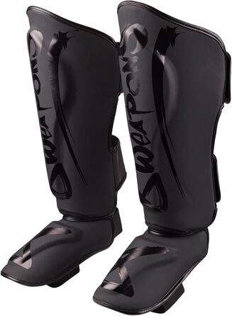 ЗБРОЇ Щитки для гомілок Unlimited 2.0, матово-чорні, для тренувань та змагань, високоякісна синтетична шкіра та ідеальна амортизація, муай-тай, K1, MMA, карате та кікбоксинг, 8