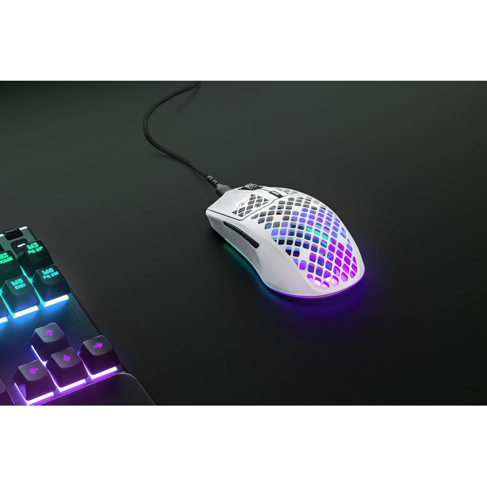 Ігрова миша з отворами на поверхні - Легка, водовідштовхувальна конструкція з пір'я - Оптичний сенсор TrueMove Core з роздільною з