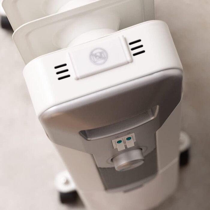 Масляний радіатор Cecotec ReadyWarm 11000 Space. Масляний радіатор потужністю 2500 Вт з 11 нагрівальними ребрами та 3 рівнями потужності, площа охоплення 25 м, місце для зберігання кабелю, легке керування, ручка, колеса. Білий. 2500 Вт